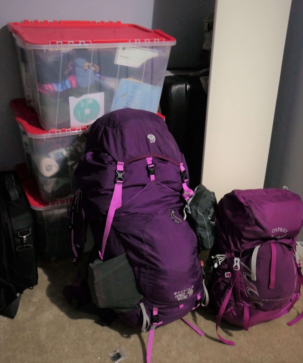 The purple are my travel bags and the three bins are items that remain in Canada.  This photo shows all that remains of my worldly possessions.