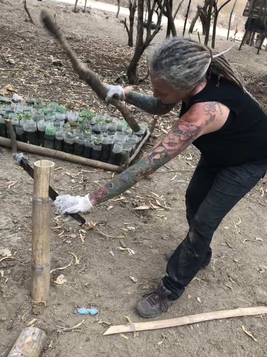 Me learning how to build using bamboo, a machete, hacksaw and wire!